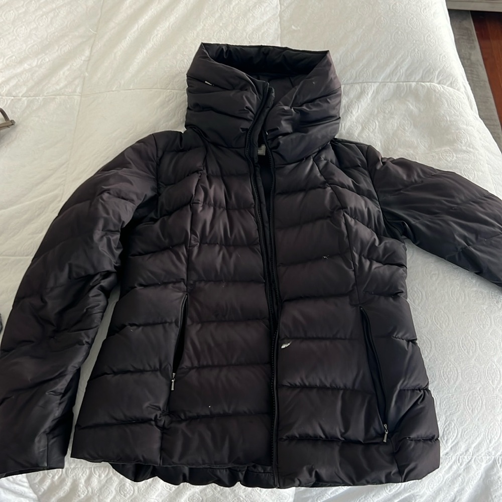 Women’s Medium black Patagonia down winter jacket! Waist length